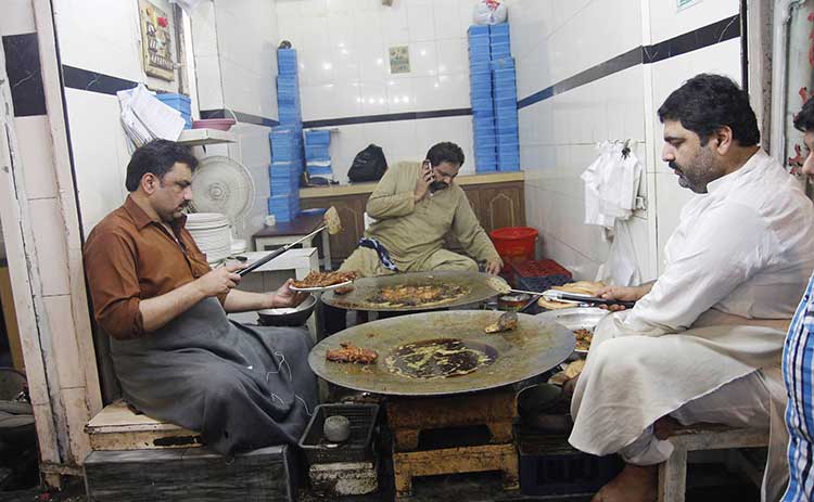 Kasuri Methi Fish being prepared at Nawaiyaan Galiyaan, Kasur