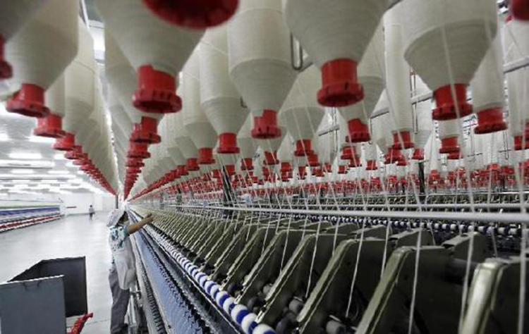 Textile manufacturing companies are relocating to Xinjiang